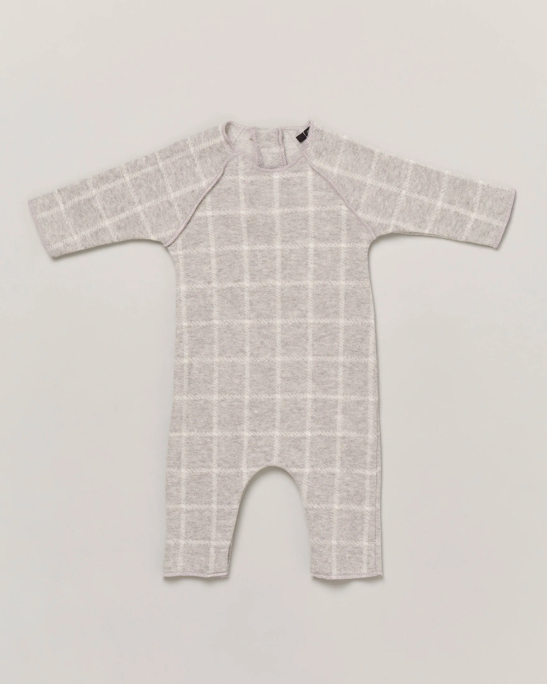 Tutina grigia in fantasia finestrata con manica raglan 3-9 mesi